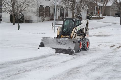 bobcat skid steer snow removal|best bobcat for snow removal.